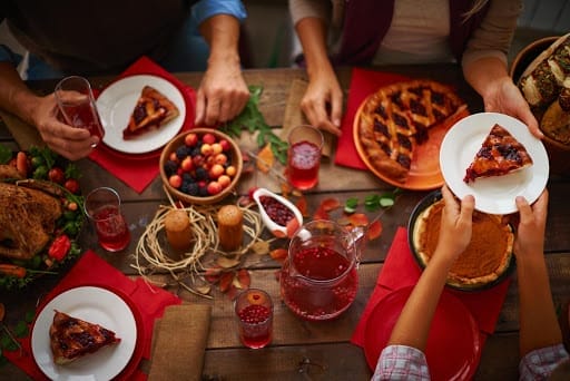 people gathered around for a holiday meal
